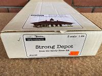 Box showing Banta Modelworks Strong Depot model kit in S scale 1:64 with price tag