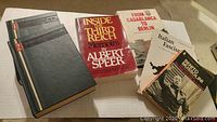Six World War II-themed books including two hardcover volumes, and four paperbacks featuring titles about Albert Speer, Mussolini, Italian Fascism, and World War II history.