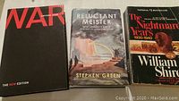 Photo showing three history books side by side, titles visible, covers in good condition.
