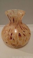 Image showing Murano glass vase from a front angle with visible marbled brown and beige pattern.