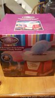 Front of cotton candy maker box showing product image and branding