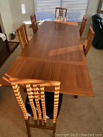 Full set view showing rectangular table with six chairs