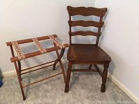 Antique solid wooden chair and vintage luggage rack side by side, showing full profile of both items