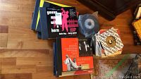 Photo showing pile of vintage vinyl records including Young Man with a Horn and Billy Daniels albums with unopened records in sleeves.