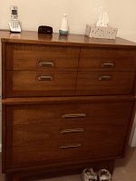 Full front view of two-piece wood chest showing six drawers and overall condition