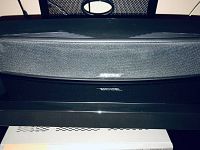 Front view of the black Bose VCS-10 center channel speaker showing the curved top design and Bose logo on the front grille.