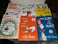 Overview of all 9 Dr. Seuss children's books in lot, showing colorful covers and titles.