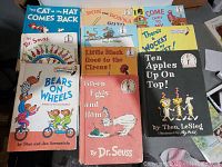 Photo of 10 kids books including Dr. Seuss, Berenstain Bears, and others arranged on table