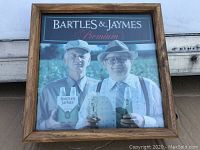 Framed Bartles & Jaymes Premium light up advertising sign showing two men holding Bartles & Jaymes products.