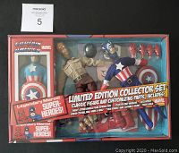 Front view of sealed Captain America action figure set in original packaging with multiple figure parts and accessories visible.