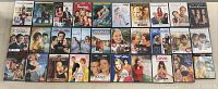 30 romantic comedy and drama DVD cases arranged in rows showing covers and titles.