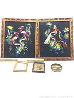 Two vintage Mexican bird pictures with carved wood frames, two small picture frames and a brass dish arranged together on a white background with ruler showing scale.