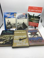 Six vintage World War 2 naval books arranged on a white surface, showing front covers with titles on German U-boats, destroyers, coastal craft, and naval warfare.