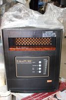 Front view of EdenPURE heater showing control panel with timer, temperature buttons and LED status bars