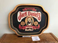 Full front view of Jack Daniel's serving tray with colorful branding and gold edges.