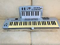 Front view showing both the 51-key and 8-key controllers side by side on a surface