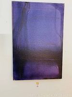 Close-up of upper portion showing purple gradients and surface texture