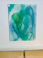 Front-on view of entire turquoise and green abstract oil painting on canvas