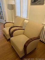Pair of club chairs in living room setting showing front and side
