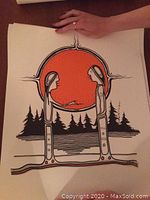 Print showing two stylized figures facing each other with an orange sun and pine tree background