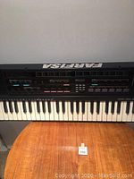 Front view of the Farfisa TK 75 keyboard showing keys and control panel with Farfisa branding