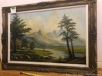 Wide view of the framed oil painting showing overall composition and antique frame