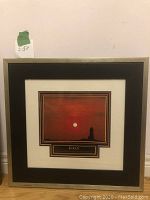 Framed print titled 'Focus' with visible silver/metallic frame, black matting, and title plaque below the image.