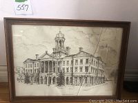 Framed ink drawing of a classical building, Victoria Hall Coburg, with visible cracked glass and a wooden frame with wear.