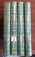 Four volumes of 'The World's Best 100 Detective Stories' showing the spines with gold embossed titles and volume numbers IX, X, XI, XII.