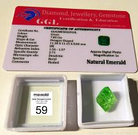 GGL Certificate of Authenticity with image of the emerald and the loose stone in a display box.