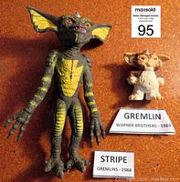 Photo of both Gremlin figures side by side with Warner Brothers 1984 labels