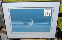 Full view of framed print with MaxSold tag visible