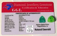 Certificate of authenticity for the emerald indicating color as green, 5.9 ct weight, trillion cut, dimensions approximately 10.95 x 10.88 x 7.92 mm, species beryl, heated and dendritic inclusions.