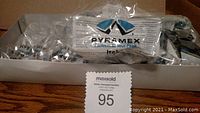 Box containing 10 Pyramex safety glasses in plastic wrappers, 5 dark and 5 clear