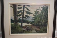 Frontal view of the signed forest landscape oil painting with visible frame and matting.