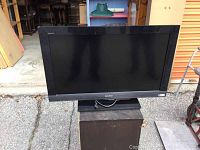 Front view of Sony Bravia 32 inch TV showing screen and base stand