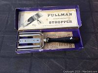 Full view of the Pullman safety razor stopper with original box and instruction sheet inside.