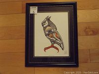 Full framed print showing the bird artwork, dark frame and white mat with label visible
