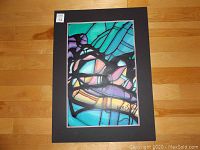Front view of the abstract acrylic painting on paper with black matt, signed by Don Chase.
