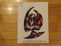 Front view of the acrylic painting on canvas titled 'The Fisher' by Don Chase, showing signature and abstract bird holding fish design.