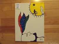 Full view of the acrylic painting on canvas showing the stylized face profile with three colorful feathers and a large yellow sun containing a figure playing a drum.