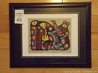 Framed fine art print showing overall view of 'Bear Doctor Healing' by Christian Morrisseau, mounted and framed with dark wood frame and double matting.