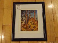 Full view of framed fine art print 'Barn in Algonquin' by Lawren Harris with black and white dotted decorative frame and white matting.