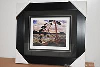 Full view of the professionally framed and matted art print "West Wind" by Tom Thomson with protective corners on frame.