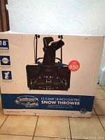 Original Snow Joe Ultra 18" snow thrower box showing branding and packaging