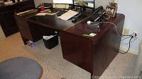 Front-left angle showing desk surface, drawers on left side, and condition with items on desk removed.