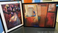Both framed art pieces side by side showing the colors and composition.