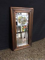 Full view of the wood framed stained glass mirror showing the overall design and condition