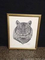 Full view of the tiger print framed in gold showing the full artwork and condition.