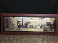 Framed print showing entire artwork with man on bicycle in an abstract urban setting.